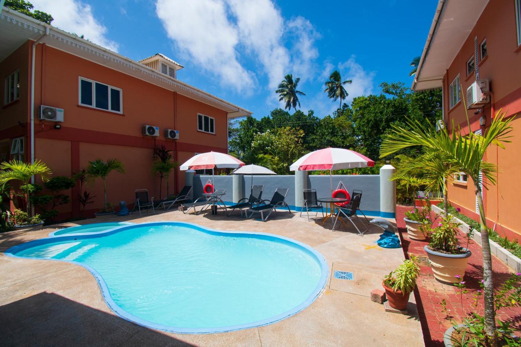 Reef Holiday Apartments Anse aux Pins Buitenkant foto